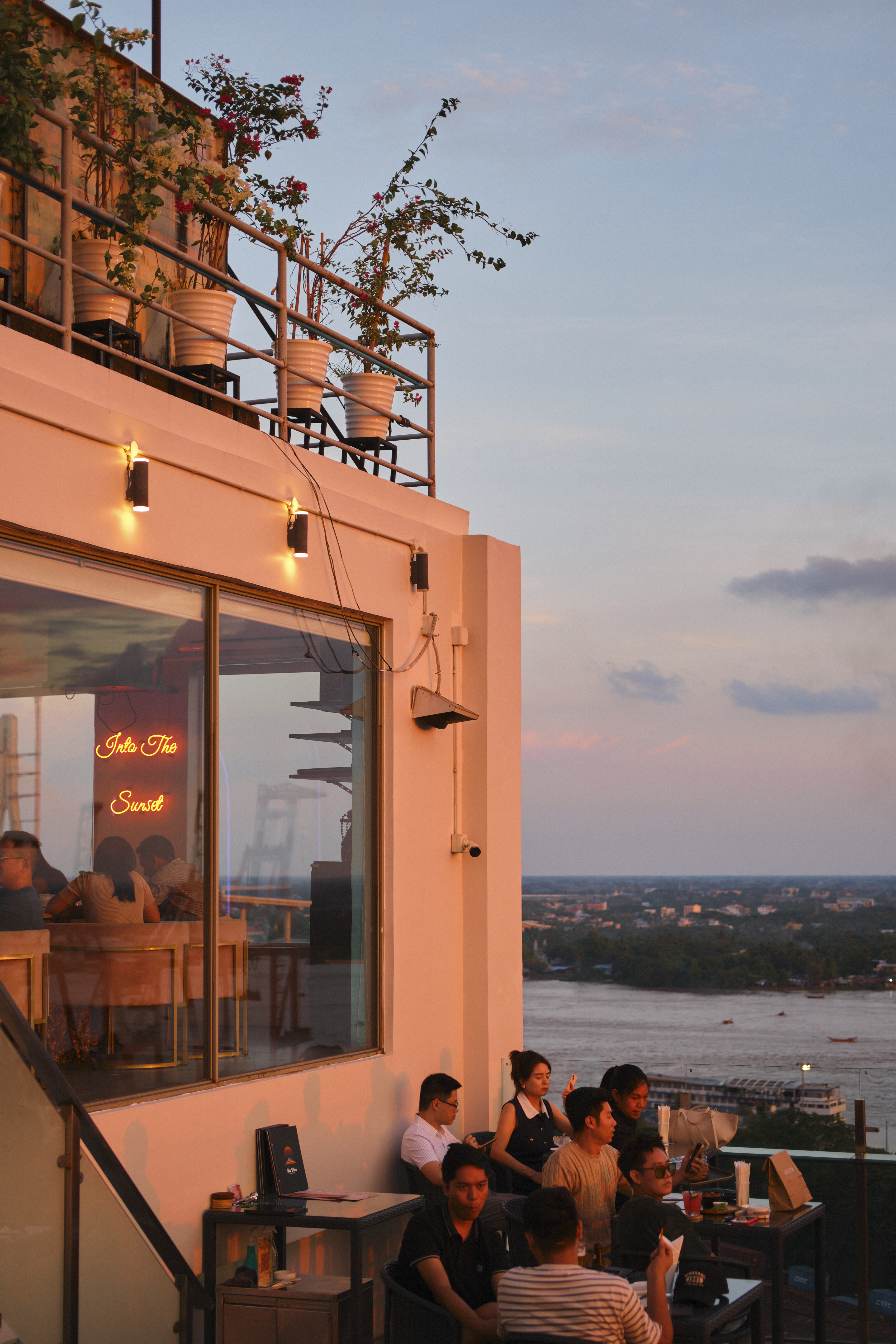 Guests enjoying The Pier rooftop terrace